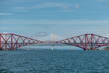 Panorama showing the center of the three bridges over the Firth of Forth, Queensferry Crossing, Rail, Road
