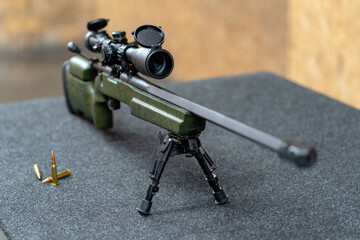 Sniper rifle with optical sight close up.