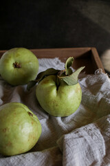Guava fruit with leaf on white wooden dark background. Fresh organic Tropical high vitamin C fruit, Healthy eating.