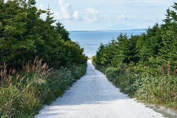 北海道稚内市　白い道と宗谷湾
