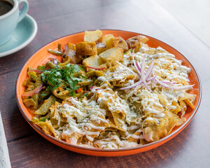 Delicious mexican breakfast, red chilaquiles