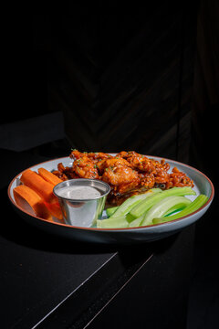 Delicious bbq style wings served with ranch dressing
