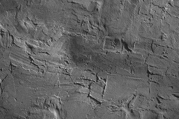 gray wall close-up, in the photo the wall is covered with gray plaster