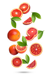 Red oranges with green leaves falling on white background