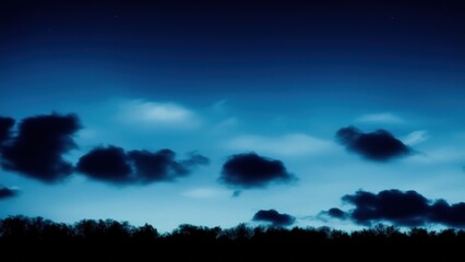 Fototapeta na wymiar Clouds in the night sky. Black blue skies.
