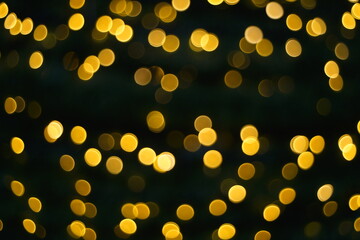 Abstract yellow gold bokeh defocus sparkles blur background