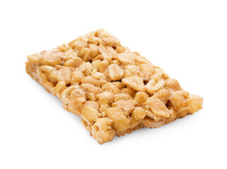 Piece of tasty peanut bar (kozinaki) isolated on white