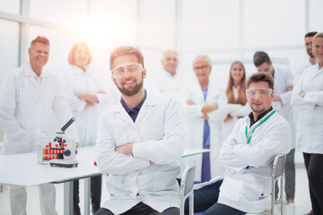 Fototapeta premium best researcher and his colleagues in the workplace