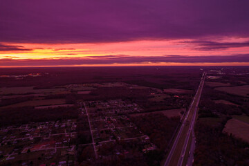 Obraz premium Red sunset in Illionois look from drone. Aerial view of red sunset in the USA