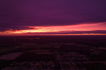 Red sunset in Illionois look from drone. Aerial view of red sunset in the USA