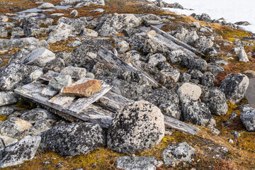 Ancient coffin at gravesite in Svalbard, Norway on the Arctic Sea. Over 100 years old. 