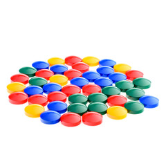 Multi-colored plastic children's construction kit, isolated on a white background. Design and modeling. Development of children's motor skills and thinking. Building different models