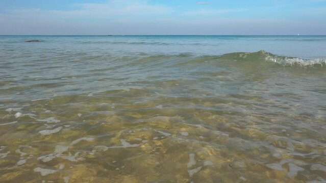 ea abstract or rippled water texture background. Calm water surface texture with splashes and waves. Abstract nature background. Surface of blue ocean water.