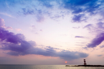 Purple evening sky at the beach, sunset with light house on the beach, tropical island