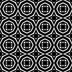 Seamless pattern of black shapes on white background.