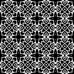 
Seamless pattern of black shapes on white background.