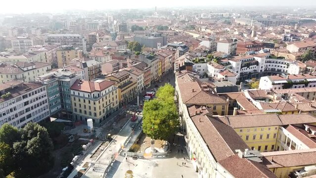 Vivid cityscape of Bergamo on sunny day, aerial fly view