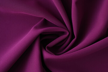Shaped purple fabric as background or design element.