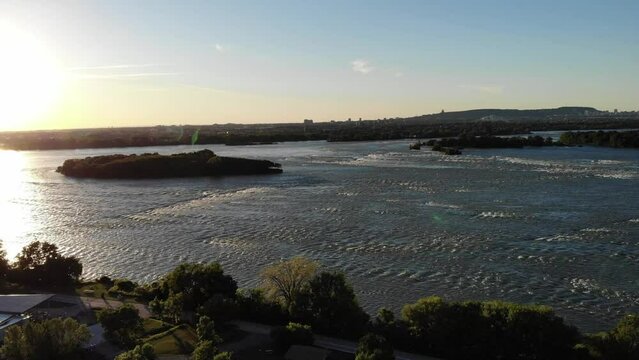 view of the St. Lawrence river and island of Montreal during sunset