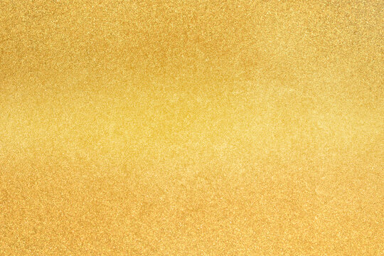 Abstract Shiny Gold color background Bright vintage texture.