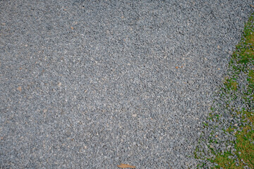 White crushed stones texture background. Gray rubble construction rock pebble pattern. 