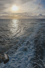 View from deck over bow and side of legendary Cunard luxury ocean liner Queen Mary 2 cruise ship...