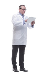 in full growth. a competent mature doctor with a digital tablet.