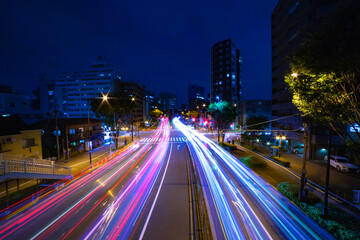 A night traffic jam at the city crossing in Tokyo wide shot
