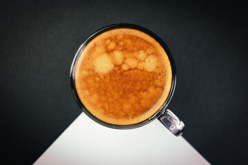 hot black coffee put on white and black table, freshness hot coffee