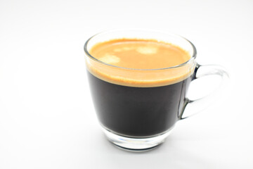 hot black coffee put on white table background