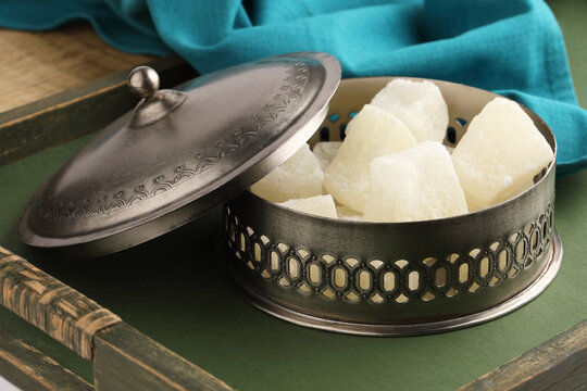 Indian sweet Petha or Agra Petha,  is a popular Indian sweet made from Ash Gourd. It is soft chewy and candy-like, eaten dry or dipped in sugar syrup or Chashni. It is sweet of Agra.