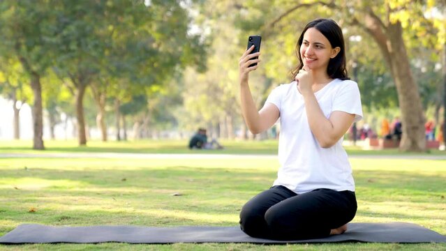 Yoga girl taking selfies