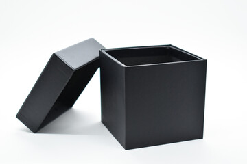 black paper box on white background, packaging industry