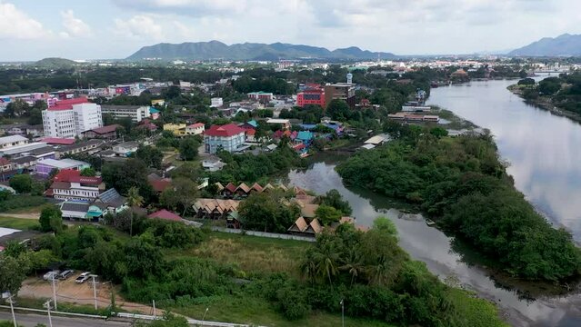 Bird's-eye of the river Kwai and small buildings around the river