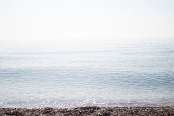 Seascape with pebble stone beach sea landscape coast