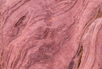 Closeup of the pink and brownish color stone