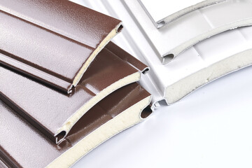 Sandwich panel close-up on white background isolated, material for the construction of garage doors