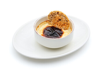 Traditional Turkish sweet bakery rice pudding in porcelain bowl Turkish name Firin Sutlac