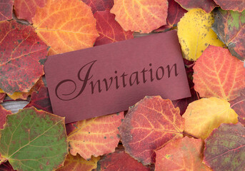 Invitation card with autumn leaves and english text