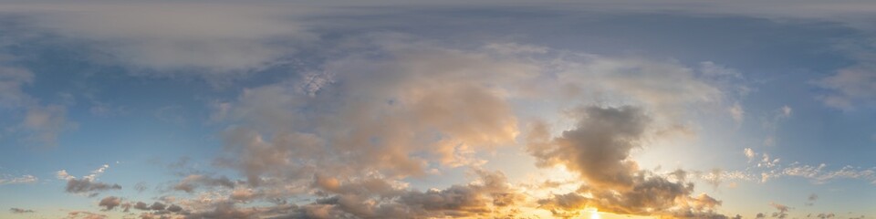 Dark blue sunset sky panorama with golden Cumulus clouds. Seamless hdr 360 panorama in spherical...