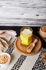 Healthy superfood. Plant vegan milk - pea milk, lactose free nutrition. Aesthetics background