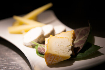 Assorted cheese platter. Traditional spanish tapa with manchego cheese, gorgonzola, goat cheese, cured cheese.