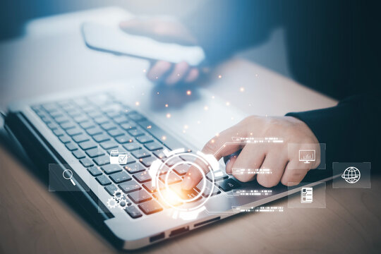 Concept financial transactions online, businessman use laptop with point at financial analyzing data while discussion, planning brand promotion budget, raising company awareness in social media