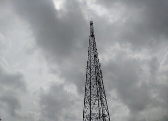 A mobile tower in a cloudy sky