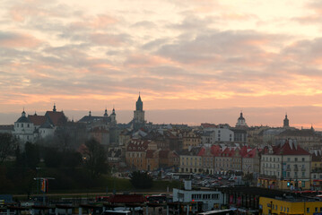 Skyline of Lublin Old Town at misty sunset in January