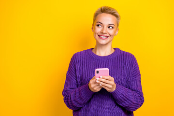 Photo portrait of attractive short blonde hair blogger hold phone chatting dream look empty space...