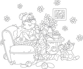 Funny elderly chubby housewife with a merry fattened cat sitting in an old easy chair and knitting a long warm scarf at her leisure after household chores, black and white outline vector cartoon