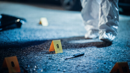 Expert in Coveralls Starting to Pack Evidence on Crime Scene After a Tragic Ending of a Violent...