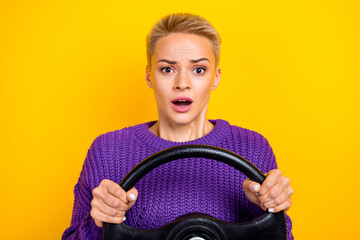 Photo of nice cute pretty astonished girl with short hairdo wear knit sweater hold steering wheel...