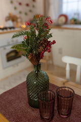 christmas decoration with burning candles in white interior